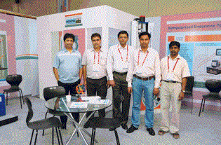 Star Testing Systems Team Members at Exhibition Booth
